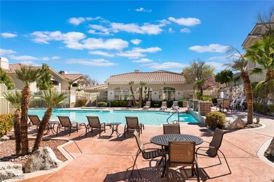 Pool featuring a patio and fence