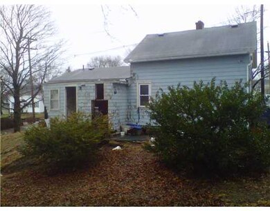Exterior Front. rear house with deck and porch not