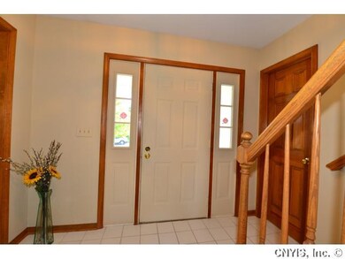 Foyer. Light and Bright Tile Foyer to Greet your G
