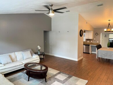 Living room and hallway to Bedroom 1 & 2 with Full Bathroom