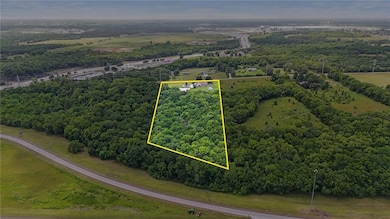 View from back of property looking south.  Off ramp of K10 also shown.