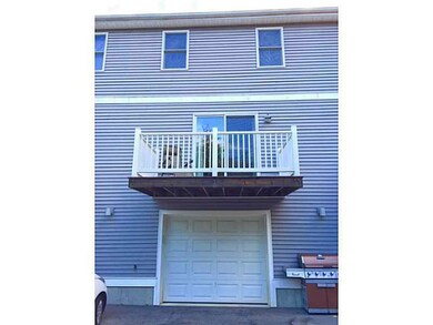 Exterior Back. Garage under neath, deck off living