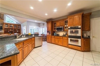 Kitchen with appliances with stainless steel finis