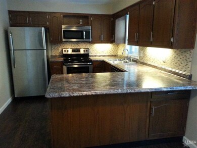 New cabinet hardware, new counter tops sink and fa