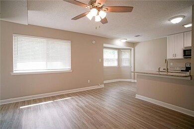 Dining Room is open to the kitchen with room for b