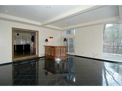 Family Room. A built-in bar is included
