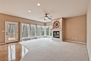 Check out the extra large windows! Living open to dining and kitchen.