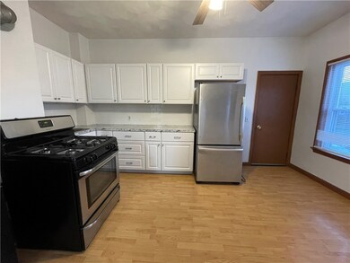 SUNNY AND BRIGHT WET FACING WITH NEW SS APPLIANCES