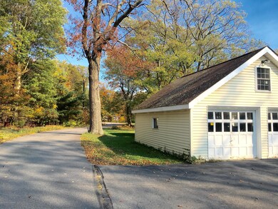 View Down Road Past Garage