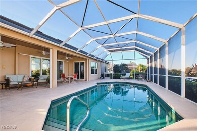 Outdoor pool featuring a lanai, a sunroom, a ceiling fan, a patio area, and an outdoor living space