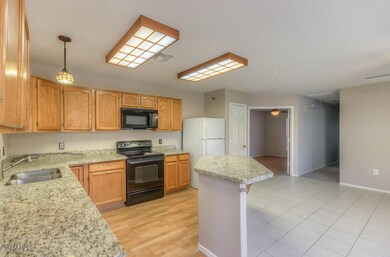 Kitchen with Island and Granite
