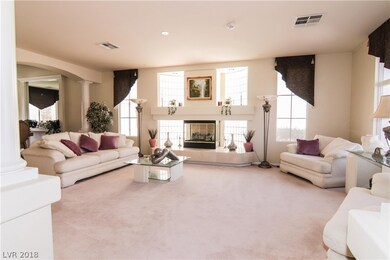 Huge formal living room with fireplace