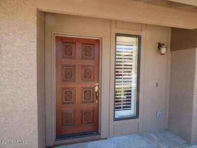 Carved Door/Plantation Shutters