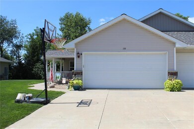 View of garage and condo entry.