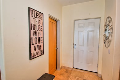Entryway looking towards front door and entrance t