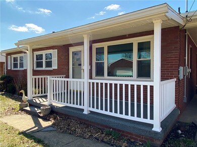 Watch the world go by on your covered porch with m