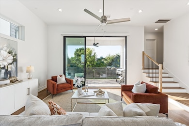 The 10-foot retractable sliding door seamlessly blends indoor and outdoor living—perfect for entertaining. Open it wide to extend gatherings onto the expansive 8x15-foot patio and BBQ on the included Halo Elite4B Griddle Grill.