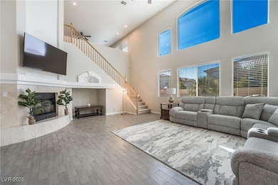 Open and spacious living room with stairs that lea