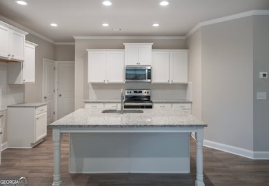 Photo of Georgian Townhome Plan Currently under co