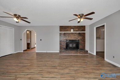 Laminate flooring, fireplace, ceiling fans