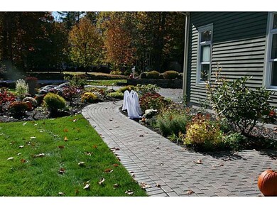 Exterior Front. Custom brick walkway...