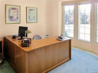 Den can serve as in-home office.  Accessed by beve