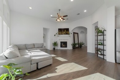 Living Room open to entry hall and kitchen.