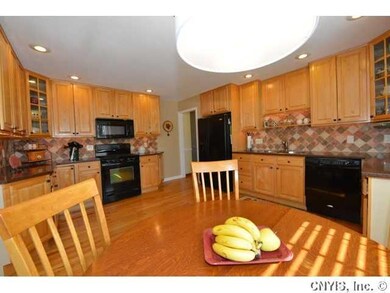 Kitchen. Check out the tiled back splash and under