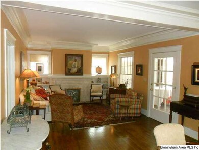 Large living room with built in bookcases, origina