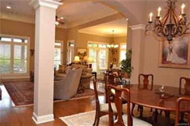 Fine amenities include stylish lighting, plantatio