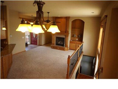 Hardwood floors flow through the kitchen and dinin