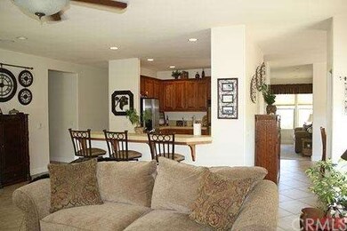 View from family room at kitchen and hallway to di