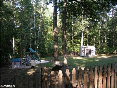 Exterior Back - Private wooded .72 Acre lot, Rear 