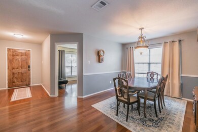 Dining area featuring dark hardwood / wood-style f