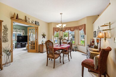 Formal dining area. The open floor plan with oversized windows.