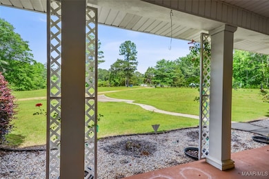 Front Exterior Patio to Front Center View