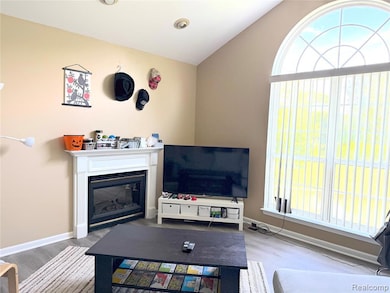 Great Room with Fireplace and large windows.