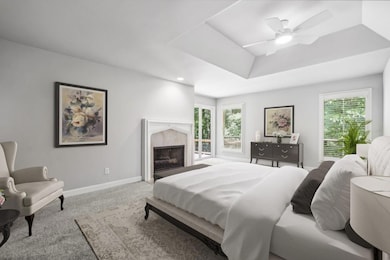 The Main-Level Primary Suite features Double Vanit