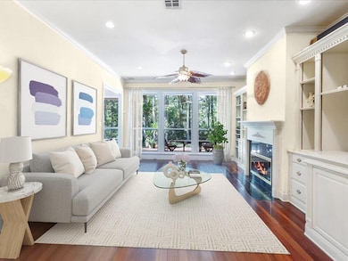 Family room w/ hardwood floors, built-ins, fireplace and fantastic views!