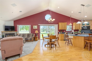 Open living, dining room kitchen area. Great for e