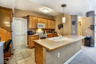 Open and bright kitchen with desk nook.