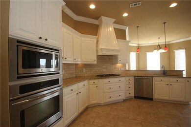 Kitchen with stainless steel appliances, granite c