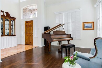 The Formal Living Room features classic sliding Ne