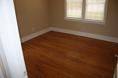 Bedroom with beautiful original hardwood