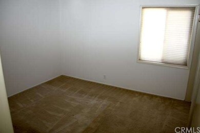 Bedroom #1 - white painted walls and brown tone ca