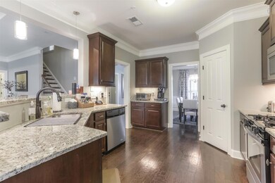 Granit, Rich Dark woods and Stainless Package In Kitchen. Open to Den and eat in Kitchen