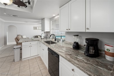 Kitchen with sink, tile floors, dishwasher, kitche