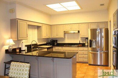 KITCHEN GRANITE TOPS, NICKEL FAUCET & SS APPLIANCE