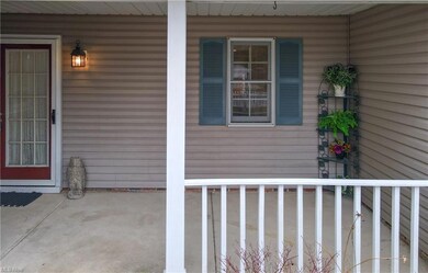 Cozy and private front porch sitting area.