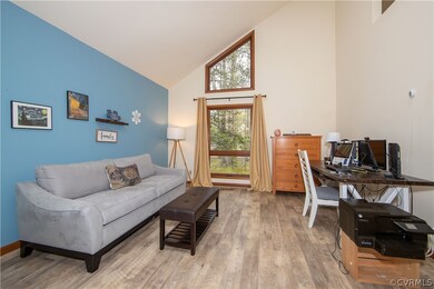 Vaulted living room with newer LVT floor!